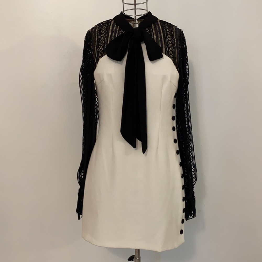 White dress with black lace sleeves